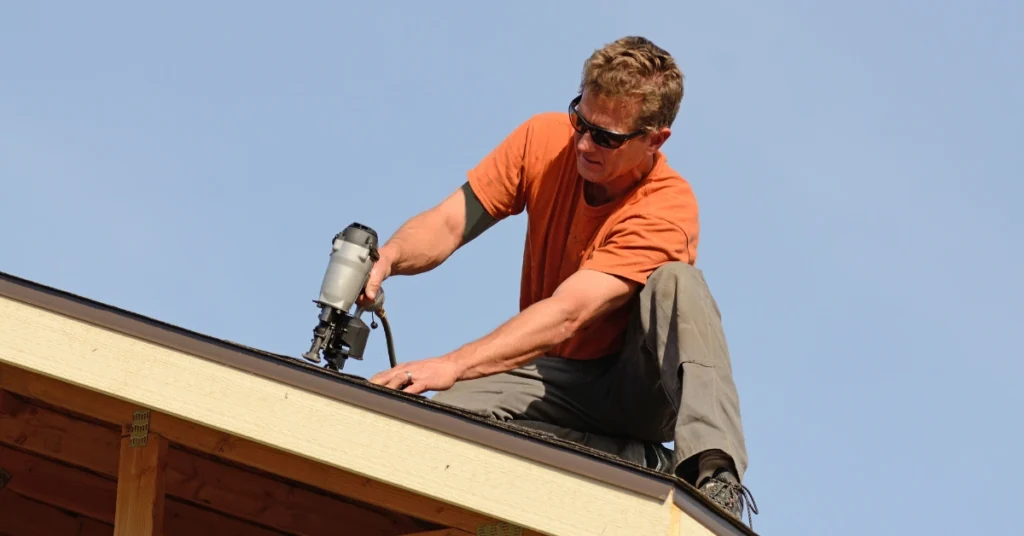 An image showing a roofing contractor providing an estimate for roof installation in Staten Island.