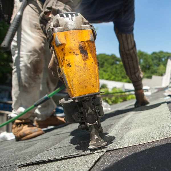 Image showing a final inspection of a newly installed asphalt shingle roof.