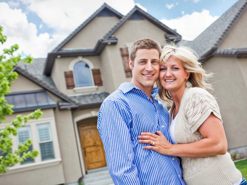 Image showing homeowners after having their roof replaced.